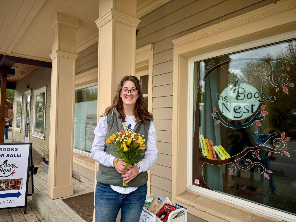The Book Nest owner Andrea Amstutz stands for a photo outside the shop April 19, 2025. (Grace Gorenflo/Valley Record)