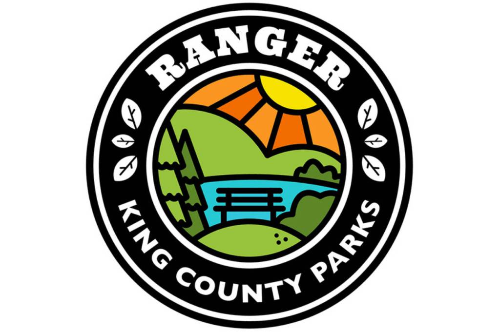 This insignia will be on King County Park Rangers uniforms, vehicles, and mountain bikes. Inage courtesy King County