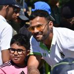 Sanjit Nayak poses with a young fan at Seattle Orcas Fan Fest. Ben Ray / The Reporter