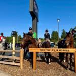 Horseback riders pose on their horses at the ribbon cutting of the Carnation Cafe horse hitch post, June 5, 2025. Grace Gorenflo/Valley Record