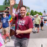 SnoValley Pride founder Gregory Jamiel wears a gold horseshoe pin to honor Duke at the 2025 Carnation Fourth of July parade. Photo courtesy of Travis Wetherbee/Last Lite Photography