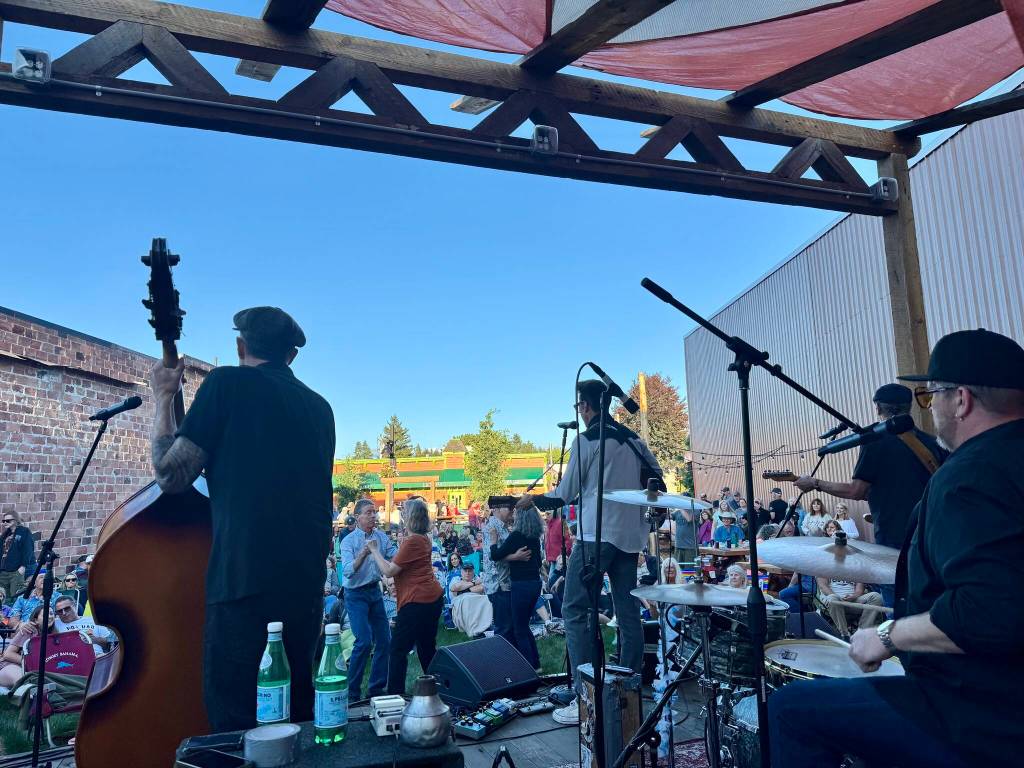 Concertgoers dance to music by local band The Dusty 45s at the opening of the Millers outdoor venue, July 3, 2025. (Grace Gorenflo/Valley Record)
