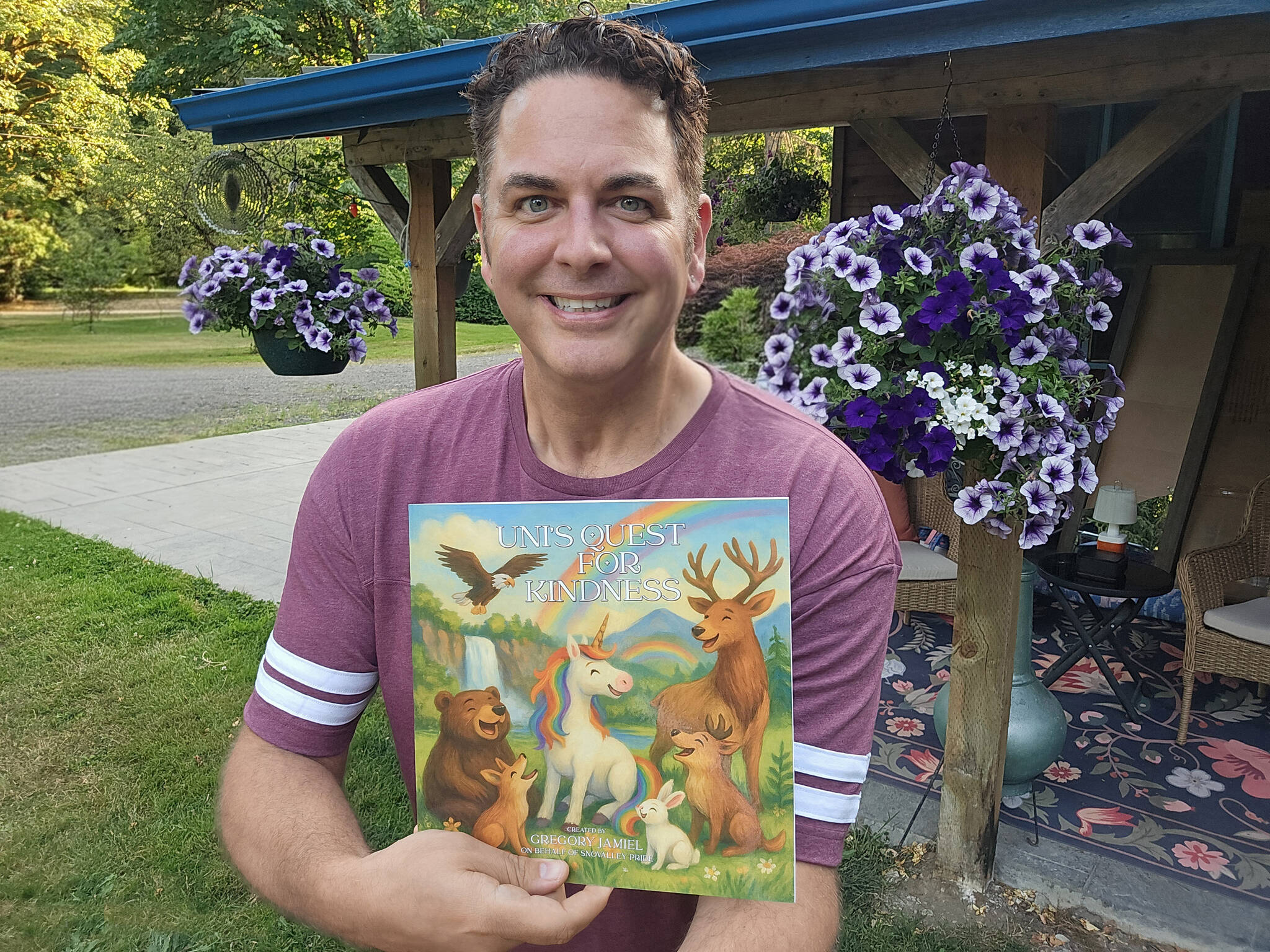 SnoValley Pride founder Gregory Jamiel with his book, Unis Quest for Kindness. Photo courtesy of Gregory Jamiel