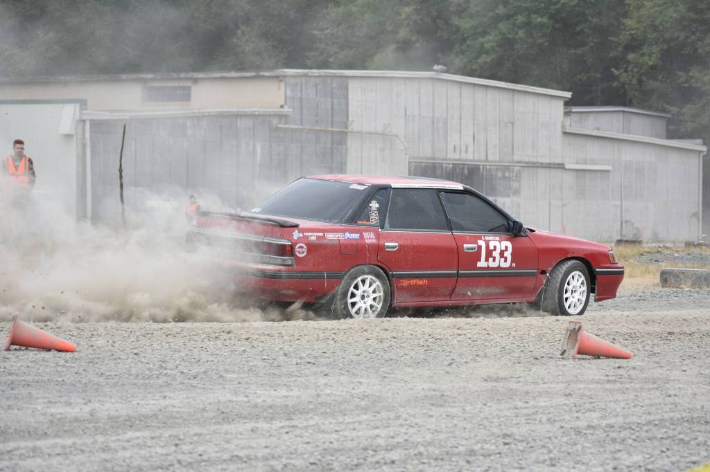 Ben Ray/Sound Publishing
Subaru Legacy drives around a corner at DirtFish.