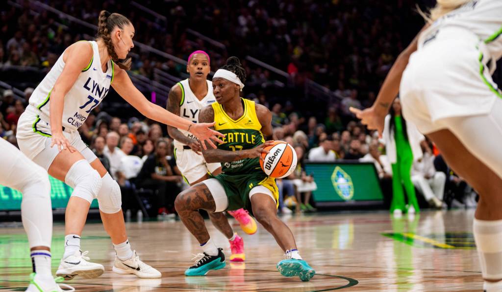 Erica Wheeler drives to the basket against the Minnesota Lynx. Photo courtesy of Seattle Storm.