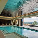 The indoor pool, with doors open to the deck, at the Snoqualmie Casinos new hotel, July 31, 2025. (Grace Gorenflo/Valley Record)