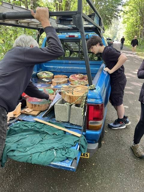 Photo courtesy of Lee Arts Foundation
A volunteer team works to set up the art for the 2025 Art in Nature trail installation.