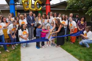 Early Learning Center Principal Meredith Macvean cuts the ribbon at the centers opening with help from students, Sept. 2, 2025. Photo courtesy of Snoqualmie Valley School District