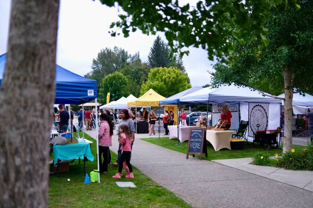 Visitors enjoy the North Bend Farmers Market, Sept. 11, 2025. (Grace Gorenflo/Valley Record)