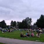 Visitors take to the lawn to listen to live music at the North Bend Farmers Market, Sept. 11, 2025. (Grace Gorenflo/Valley Record)