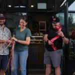 Arete owners Meghan and David Schumacher cut the ribbon on their second coffee location at The Line Bike Experience in North Bend, Sept. 12, 2025. (Grace Gorenflo/Valley Record)