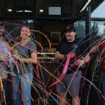 Arete owners Meghan and David Schumacher cut the ribbon on their second coffee location at The Line Bike Experience in North Bend, Sept. 12, 2025.