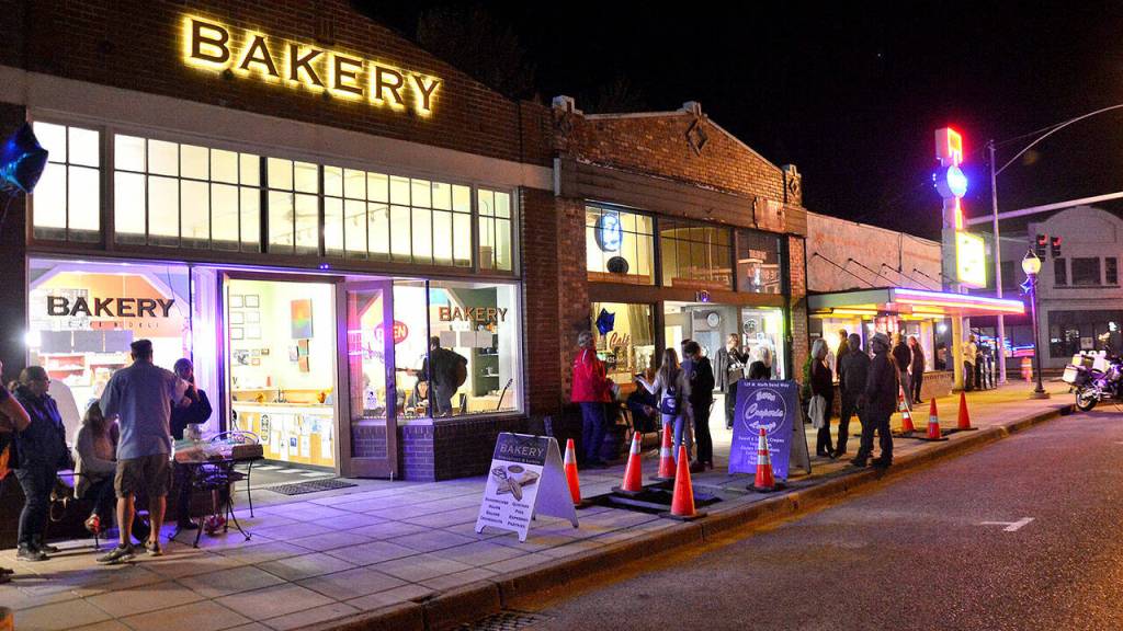 Night falls on the busy North Bend Way during the annual North Bend Blues Walk. File photo