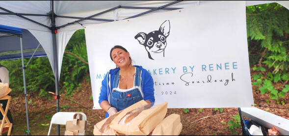 Renee Petitti, owner of Marley's Bakery, sells her fresh sourdough at the Duvall Farmers Market5. (Grace Gorenflo/Valley Record)