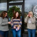Grays Mercantile founder Summer Stumpf holds back tears at the Grays Mercantile ribbon-cutting ceremony, Nov. 15, 2025. From left: Fall City Community Association Vice President Sarah Kieffer; SnoValley Chamber CEO Kelly Coughlin; Summer Stumpf; Aaron Stumpf. (Grace Gorenflo/Valley Record)
