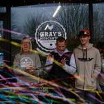 The Stumpf family celebrates after Grays Mercantile founder Summer Stumpf cuts the ribbon, Nov. 15, 2025. (Grace Gorenflo/Valley Record)