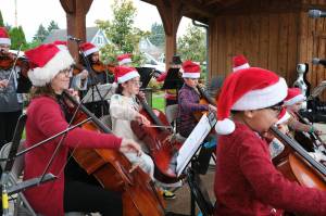 Members of the Tolt Strings musical group perform under the direction of Myra Chaney (not pictured) during the Christmas in Carnation event on Dec. 6. Photo by Aaron Gustafson