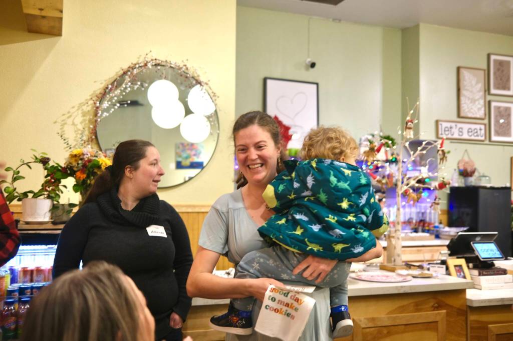 Friends and family of Cories Cafe owner Corie Goodloe tally the votes at the Great Duvall Bake Off, Dec. 6, 2025. (Grace Gorenflo/Valley Record)