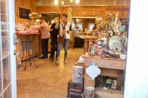Shoppers peruse a holiday market at Misty Valley Farm, Dec. 7, 2025. (Grace Gorenflo/Valley Record)