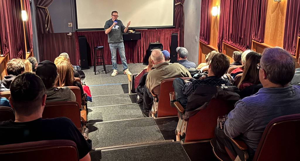 Andrew Rivers holds the audience Dec. 5 at the Tin Room Theater in Burien. Photo by James Gibowski