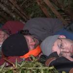 The Try Guys get ready for sleep in the bushcraft shelter they made during their night in the wilderness.