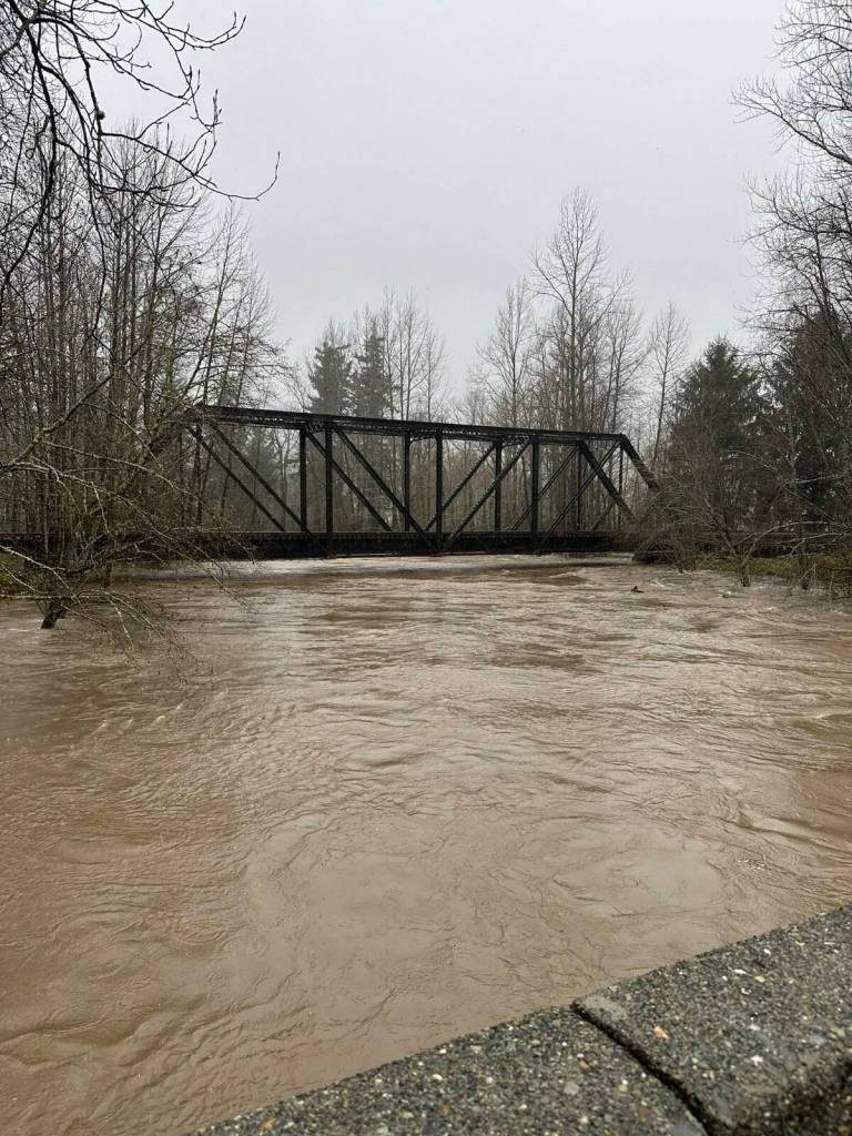 The river rises to meet a bridge during flooding in North Bend. Photo courtesy of Keegan Campbell