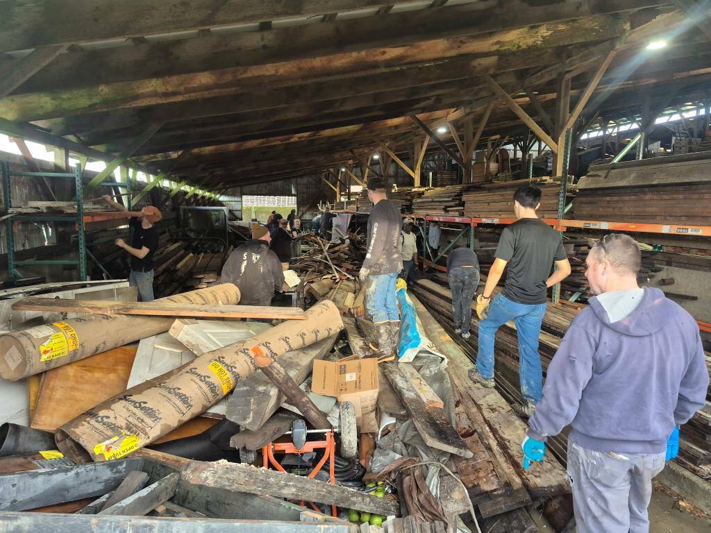 Volunteers help clean up Muddy Boots Pumpkins farm in Duvall, December 2025. Photo courtesy of Muddy Boots Pumpkins