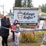 Kelsey Harris-Olsen cuts the ribbon on Kelseys Koffee with her son by her side, Dec. 28, 2025. (Grace Gorenflo/Valley Record)