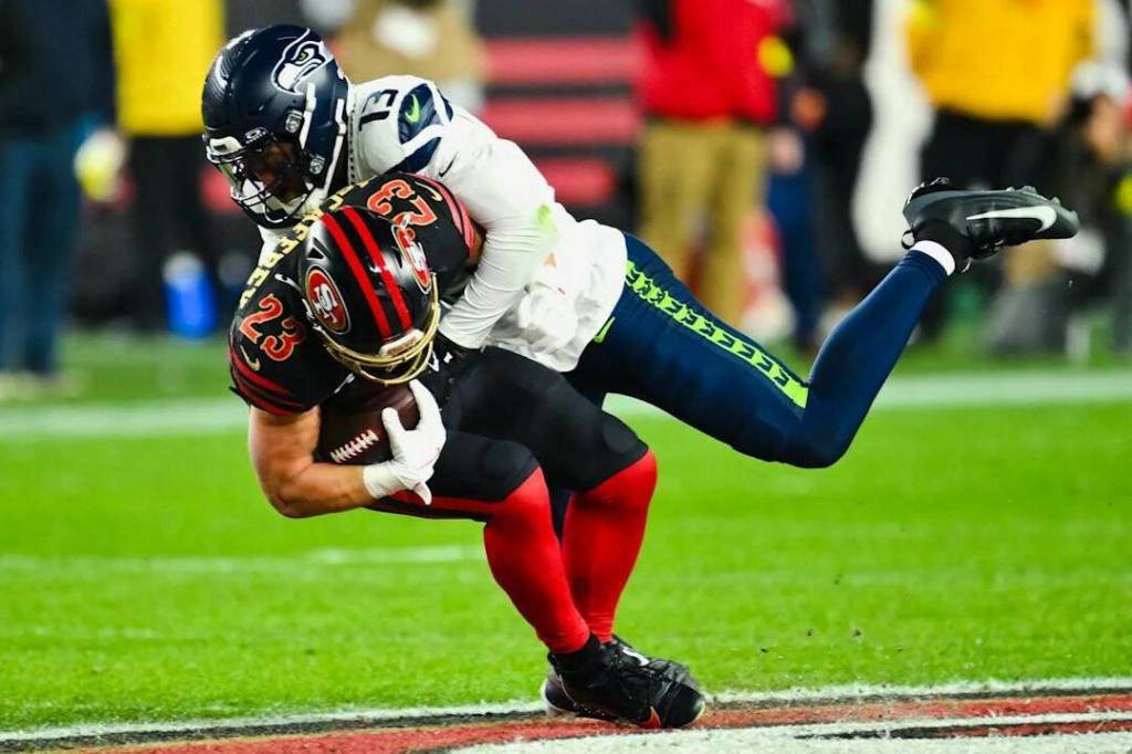 Seattle Seahawks linebacker Ernest Jones IV tackles San Francisco 49ers running back Christian McCaffrey on Jan. 3 at Levis Stadium in Santa Clara, California. (Photo courtesy of the Seattle Seahawks)