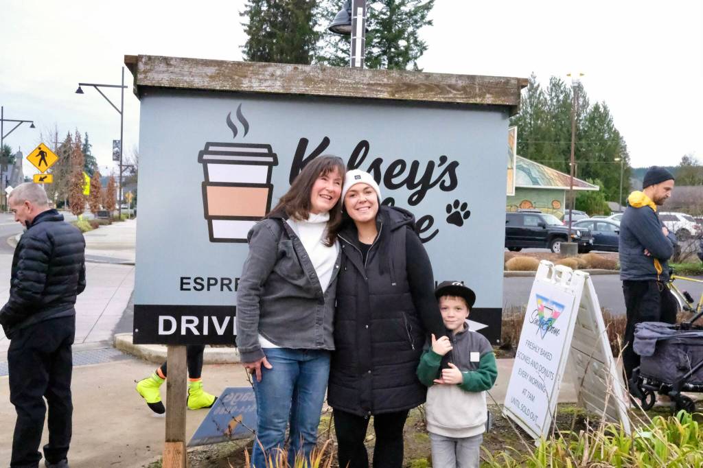 Sandy Griffin (left) stands for a photo with Kelsey Harris-Olsen and her son at the Kelseys Koffee ribbon-cutting ceremony, Dec. 28, 2025. Grace Gorenflo/Valley Record