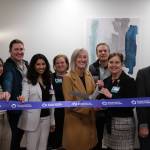 Snoqualmie Valley Health CEO Renee Jensen (right) and North Bend Mayor Mary Miller cut the ribbon on the new clinic, Nov. 19, 2025. They are surrounded by SVH providers and leaders.