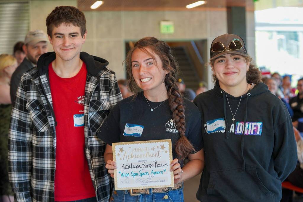 Photo courtesy of the Snoqualmie Valley School District 
Two Rivers student Maddie Merseal (right) stands for a photo with her internship mentor Katie Berman (middle) at the 2025 mentor brunch.