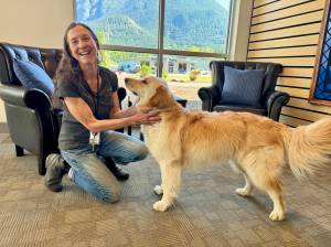 North Bends Administrative Services Director Lisa Escobar with her dog, Harley, at North Bend City Hall, May 2, 2025. Grace Gorenflo/Valley Record