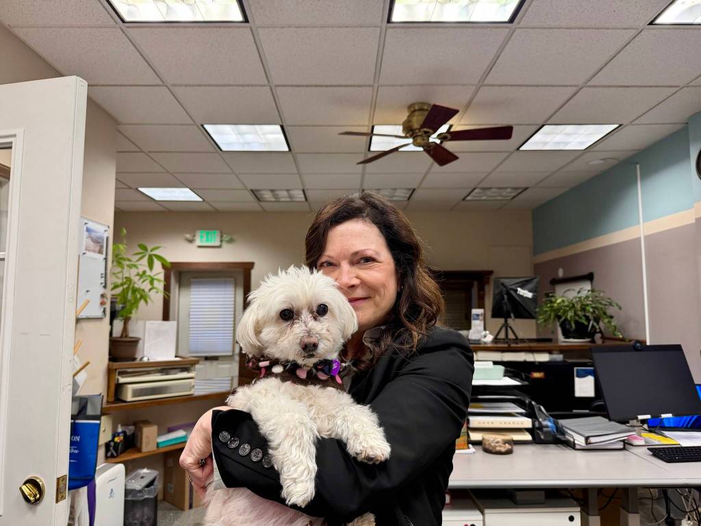 Carnation City Manager Rhonda Ender with her dog, Lulu, at Carnation City Hall, Jan. 22, 2025.