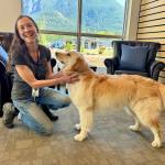 North Bends Administrative Services Director Lisa Escobar with her dog, Harley, at North Bend City Hall, May 2, 2025.