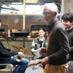 Fletch Waller, a volunteer with Wider Horizons, visits with Music in the Community club jazz band members and Mercer Island High School students, from left, Giovanni Ng (trumpet), Alanna Larson (drums) and Elliott Yaroslavsky (trumpet) at the city of Mercer Islands Senior Resource Fair on March 2, 2024, at the Mercer Island Community and Event Center. Not pictured: Ashwin Krishnaswamy (piano). Andy Nystrom/ staff photo