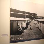 A photo in the Remembrance Gallery shows the quickly constructed living quarters in the middle of the Washington State Fairgrounds. Photo by Bailey Jo Josie/Sound Publishing