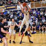 Photos courtesy of Calder Productions
Mount Si High Schools Hudson Moscrip battles for the ball Feb. 21 against Lake Washington. The Wildcats won 67-60 and havent lost a game since December.