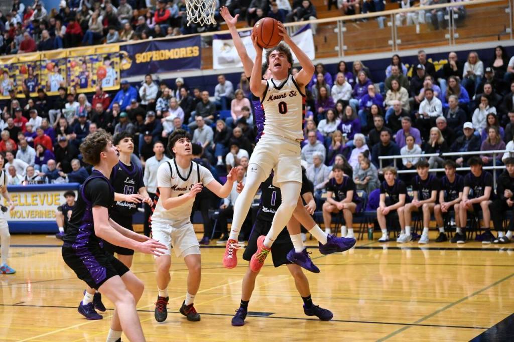 Photos courtesy of Calder Productions
Mount Si High Schools Hudson Moscrip battles for the ball Feb. 21 against Lake Washington. The Wildcats won 67-60 and havent lost a game since December.