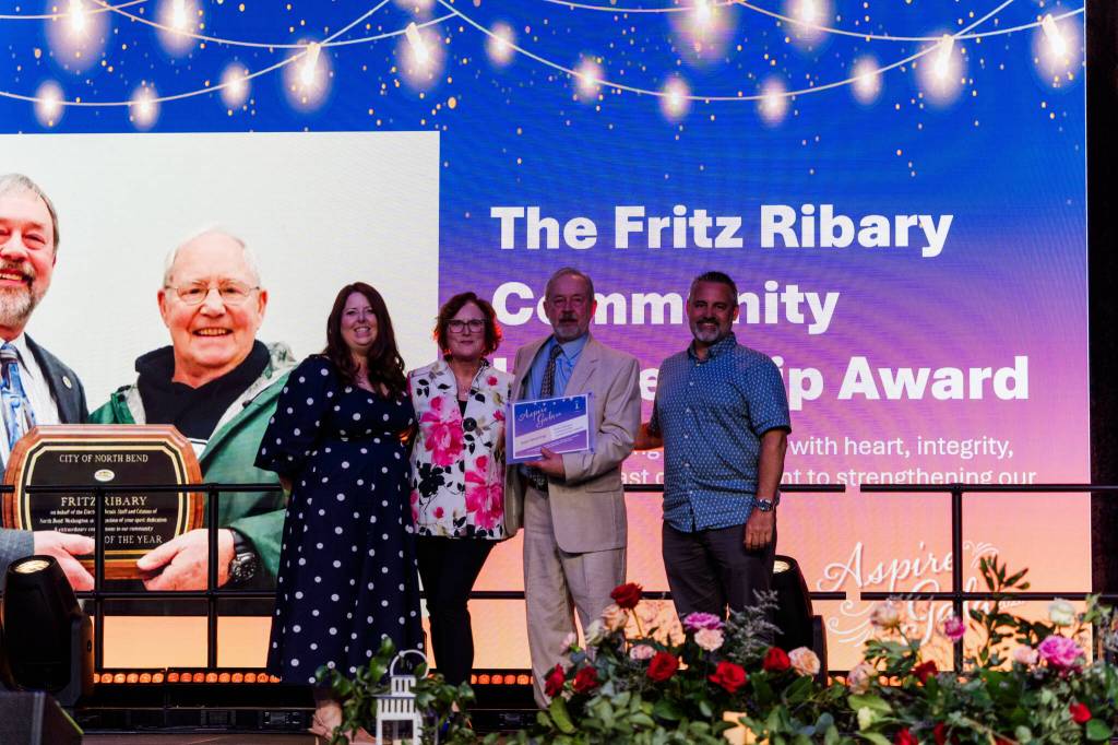 Photo courtesy of Tatiana Meyer/Grace + Light Studios
Former North Bend Mayor Ken Hearing (second from right) is presented with the Fritz Ribary Community Leadership award at the SnoValley Chamber Aspire Gala, Feb. 28, 2026.