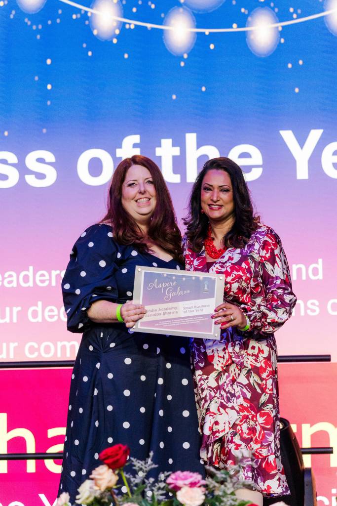 Photo courtesy of Tatiana Meyer/Grace + Light Studios
Vasudha Sharma (right) is presented with the Small Business of the Year award at the SnoValley Chamber Aspire Gala, Feb. 28, 2026.