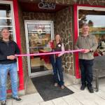 Photo courtesy of the city of Carnation
Carnation Ace Hardware co-owner Ron Cox (left) helps Carnation Co-op manager Sophia Marchetti (middle) and company general manager Mike Lukjanowicz cut the ribbon on the new shop, March 6, 2026.