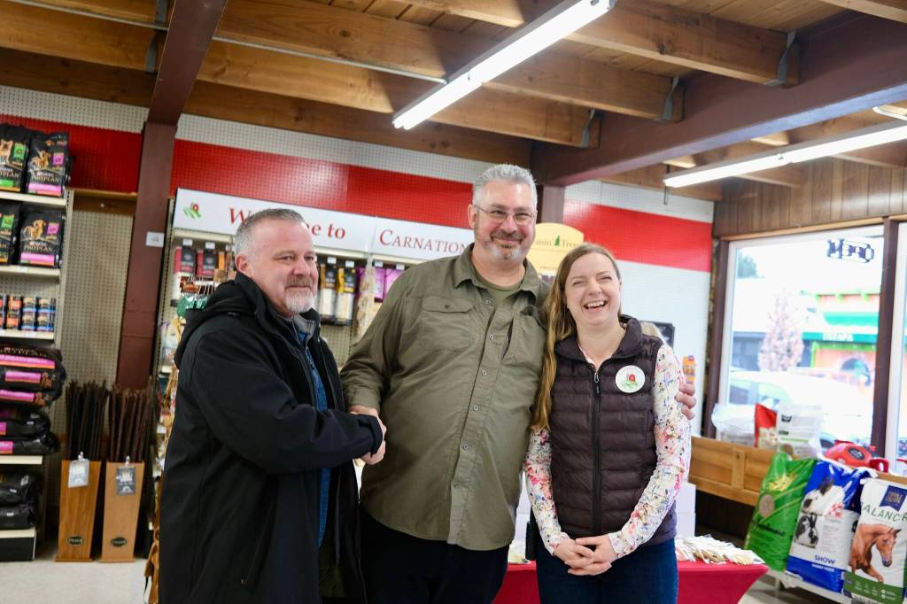 Photos by Grace Gorenflo/Valley Record
Carnation Mayor Jim Ribail stands for a photo with company general manager Mike Lukjanowicz and Carnation Co-op manager Sophia Marchetti, March 6, 2026.
