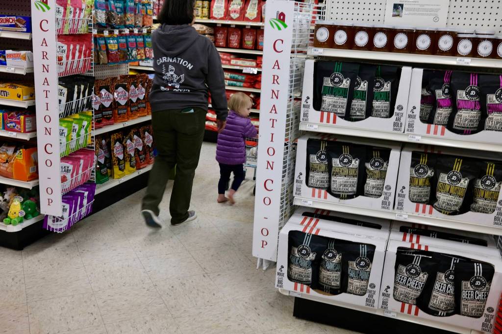 Former Carnation Ace Hardware co-owner KC Cox shops the new Carnation Co-op with her granddaughter, March 6, 2026.