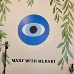 A mural on the wall inside Mastrogiannis Distillery shows the businessess mantra, made with meraki, March 5, 2026.