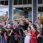 Photos by Grace Gorenflo/Valley Record
The Mastrogiannis family celebrates after cutting the ribbon on their new North Bend distillery, March 5, 2026.