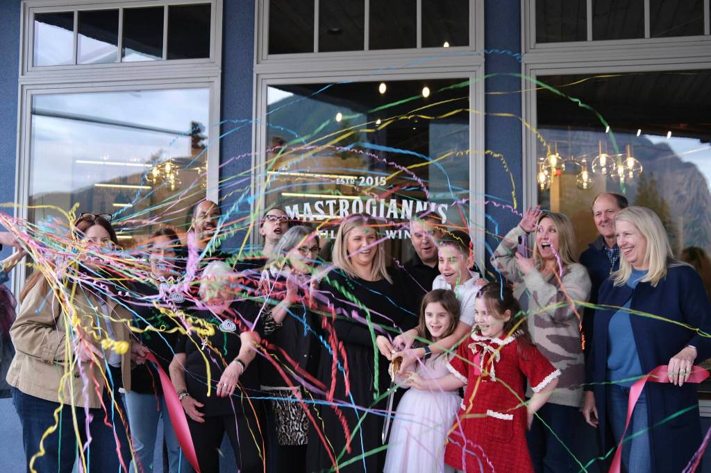 Photos by Grace Gorenflo/Valley Record
The Mastrogiannis family celebrates after cutting the ribbon on their new North Bend distillery, March 5, 2026.