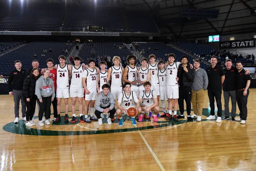 In the state tournament at the Tacoma Dome, the Mount Si High School boys basketball team lost to Emerald Ridge, 67-62, in the quarterfinals on March 5 before defeating Puyallup the next day, 74-66, in the consolation semifinal. On March 7, the Wildcats defeated Glacier Peak, 54-46, in the consolation final to claim fourth place in the WIAA 4A State Boys Basketball Tournament. Mount Sis Brady Hennig scored a game-high 22 points, while Marcus Heide scored 12 points and Latt Ford had 10 points. Photo courtesy of Calder Productions