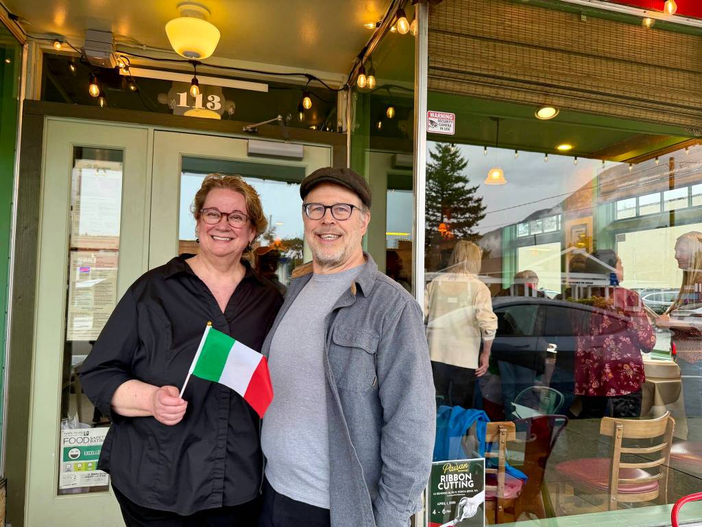 Beth and Kevin Burrows outside their restaurant, Paisan Ristorante, April 1, 2026.