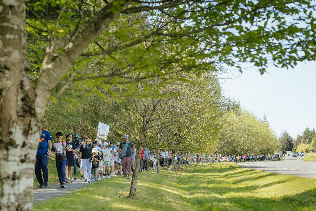 Photos courtesy of Whitney Schrader
Locals march to Fisher Creek Park in Snoqualmie Ridge, April 26, 2026.